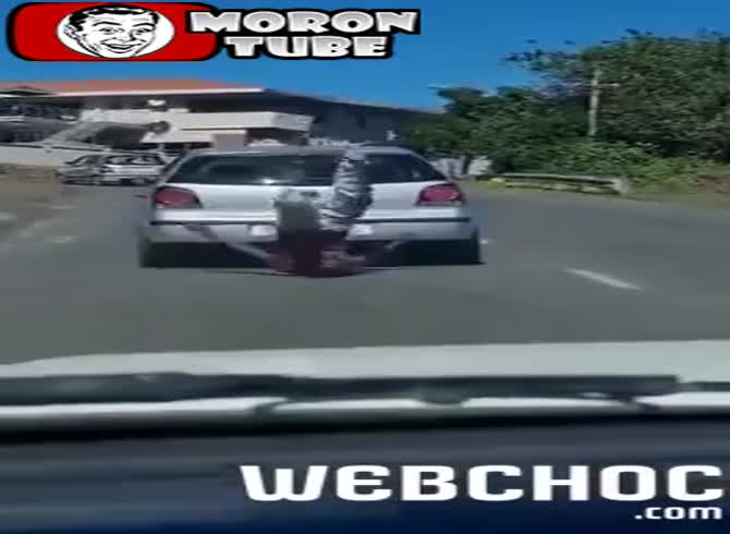 Video: He pays heavily while standing atop a moving vehicle